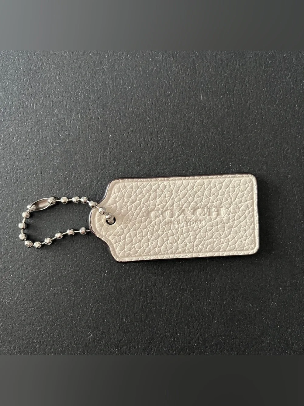 COACH New York hang tag
